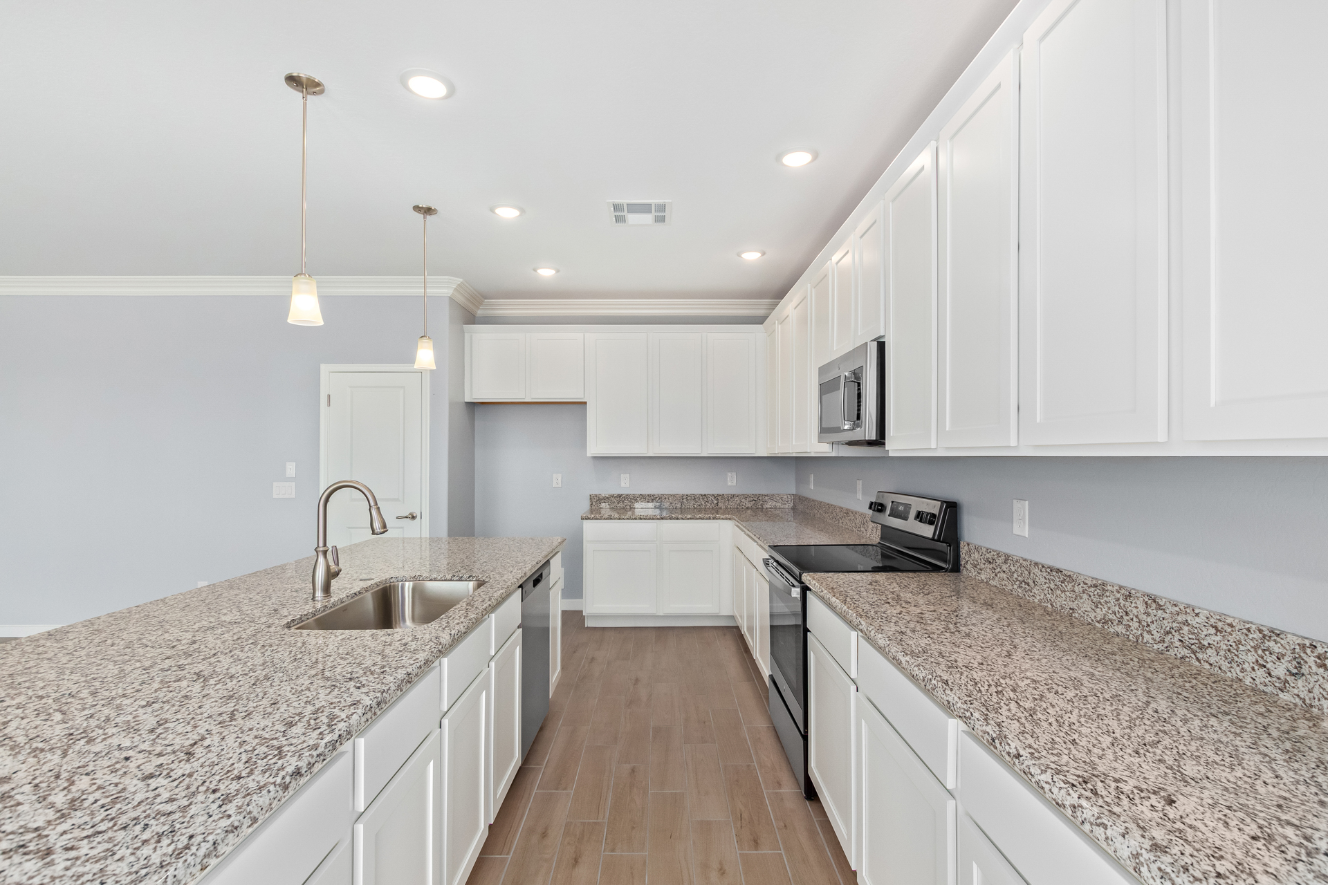 Marigold 4412 Floor Plan kitchen with white shaker cabinets