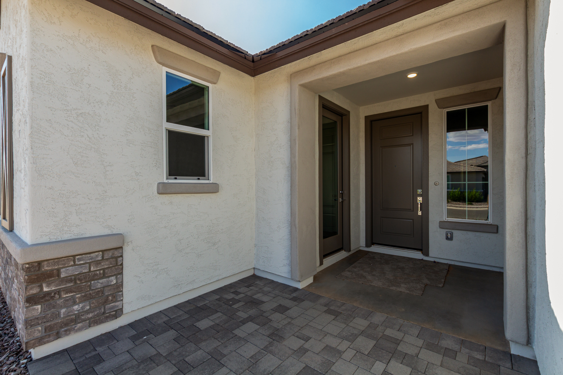 The Poppy floorplan's front porch and entry door.