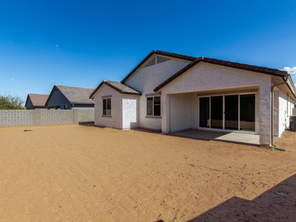 The poppy floorplan backyard and oversized large covered patio.