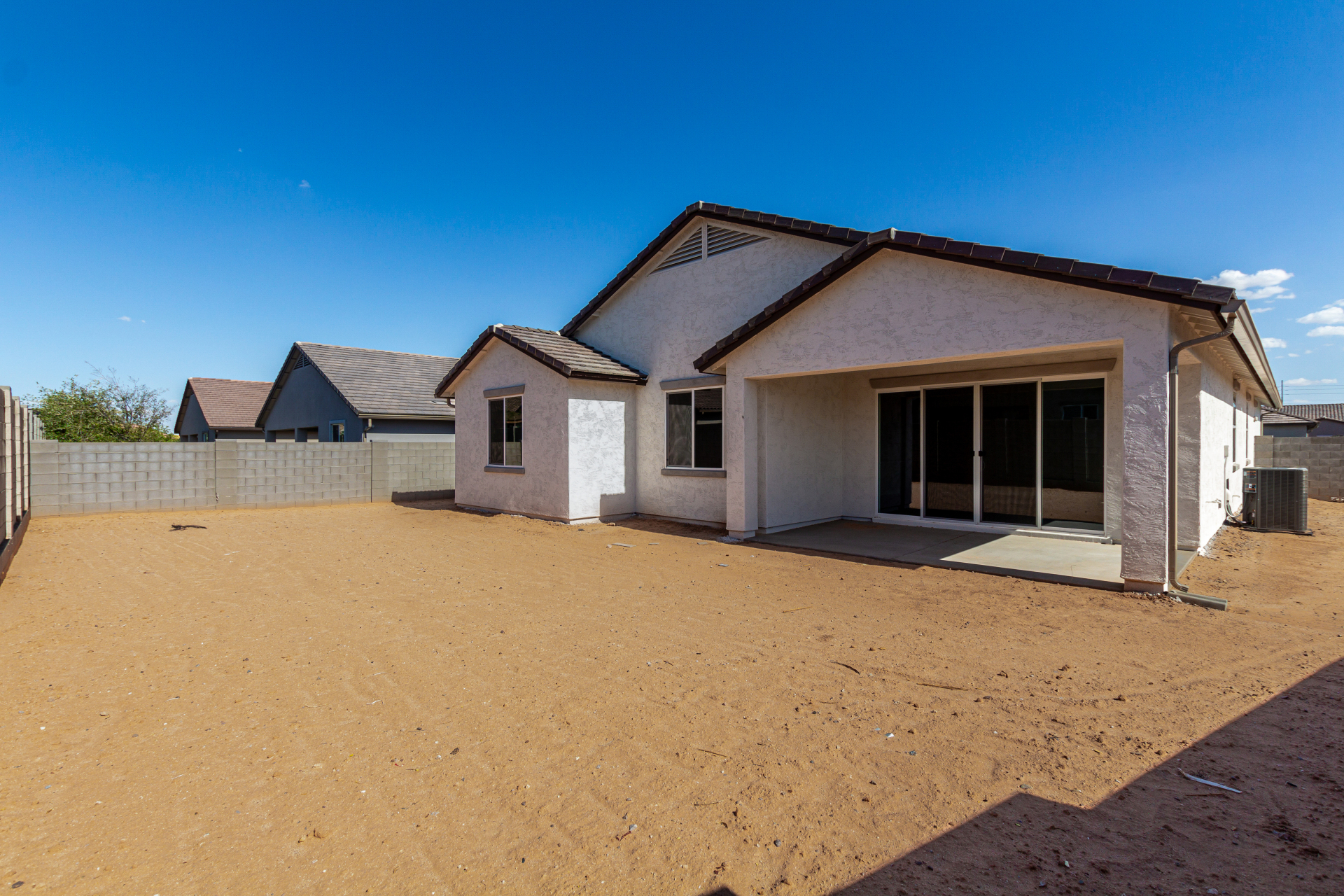 The poppy floorplan backyard and oversized large covered patio.