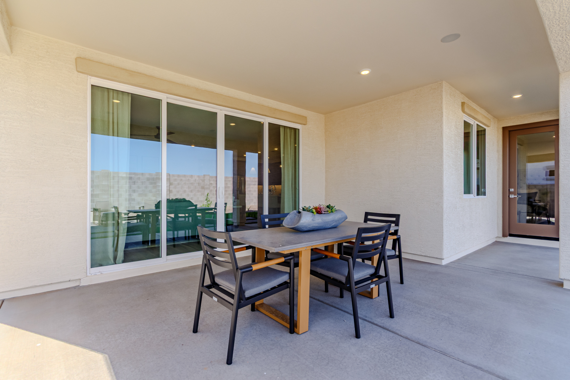Poppy Model Home showcasing an oversized patio