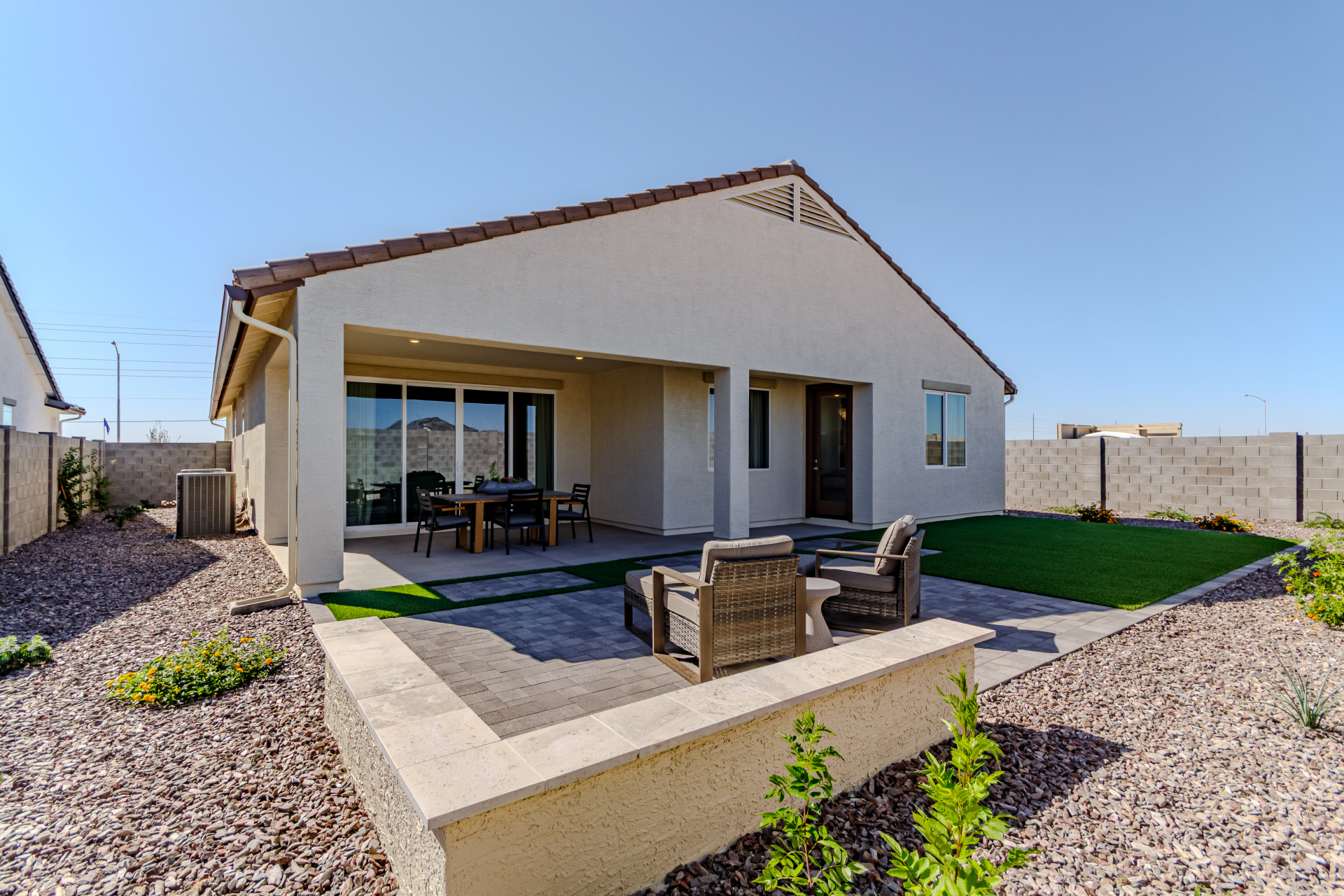 Poppy Model Home as seen from the rear yard looking into a large patio