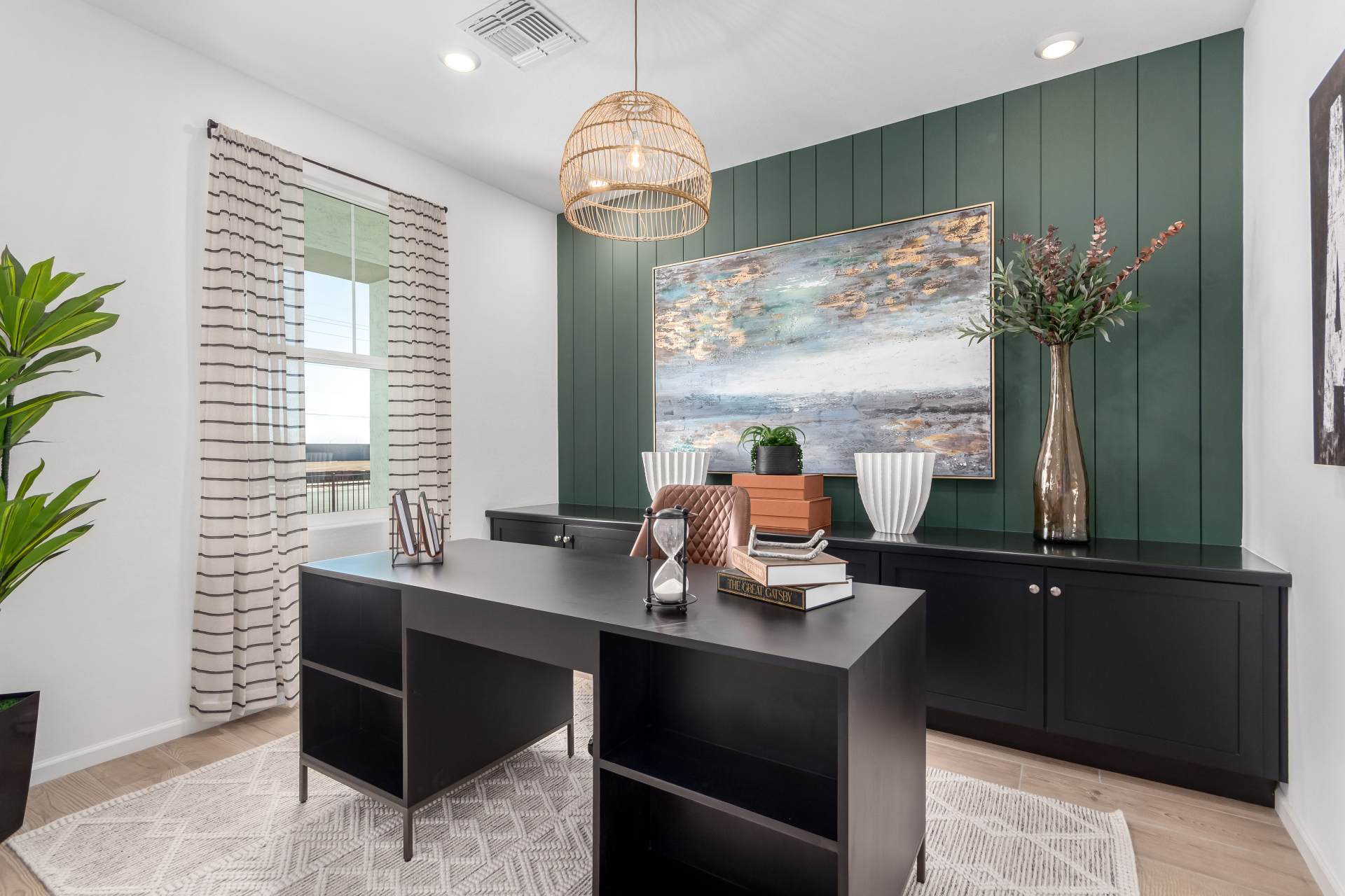 Journey model home den with a home office set up