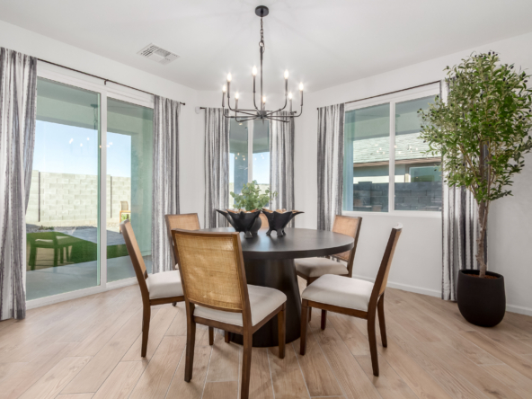 Journey model home breakfast nook featuring a round 6-person table