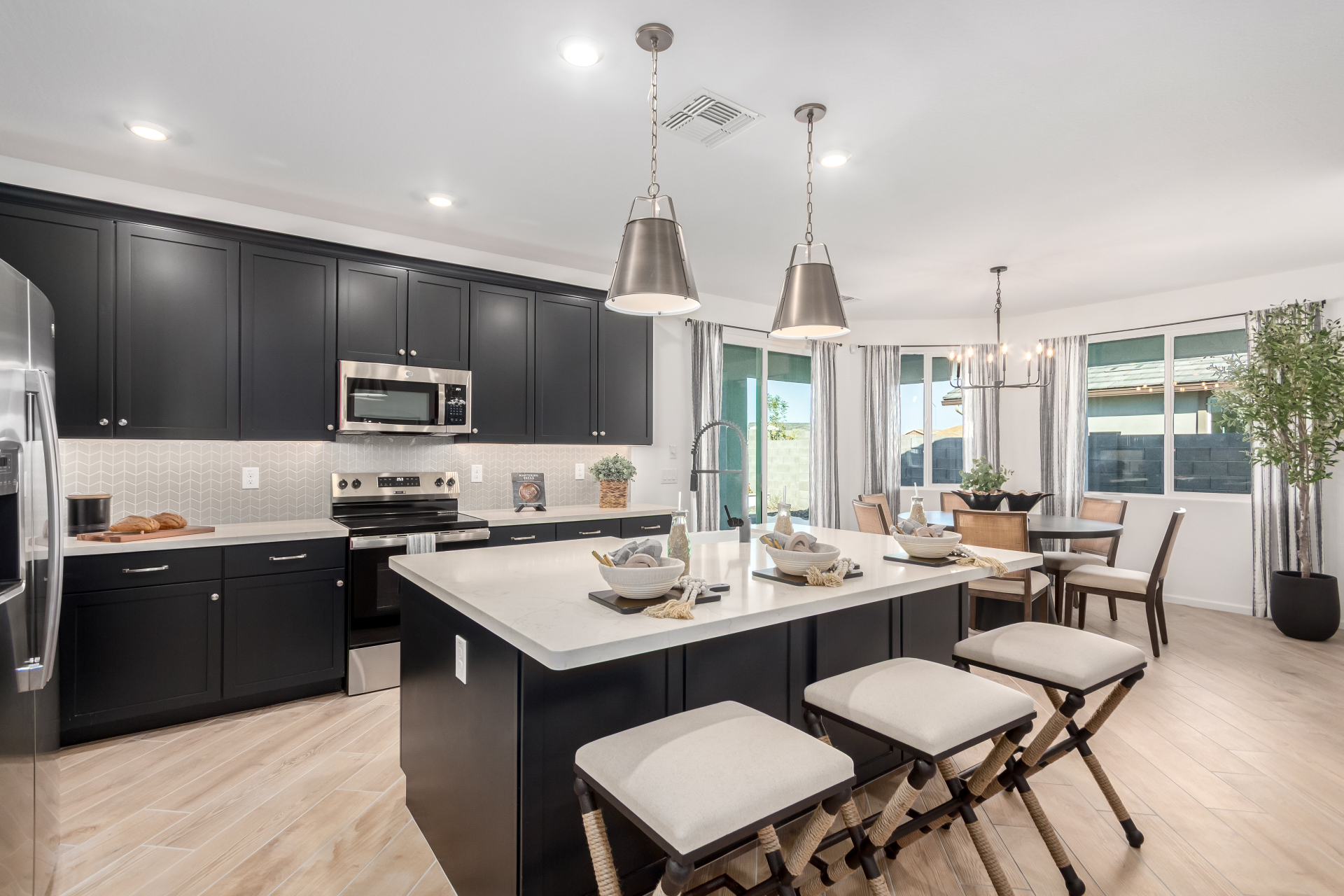 Journey model home kitchen featuring a large island