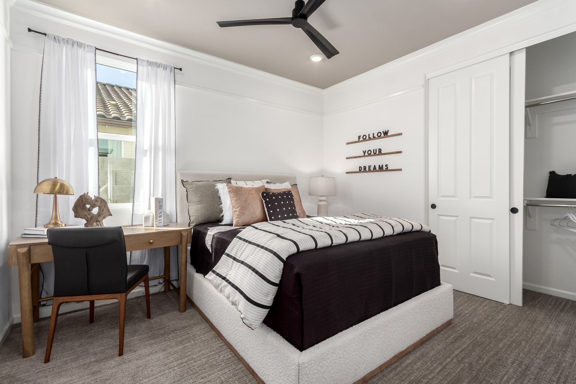 Journey secondary bedroom with a full sized bed