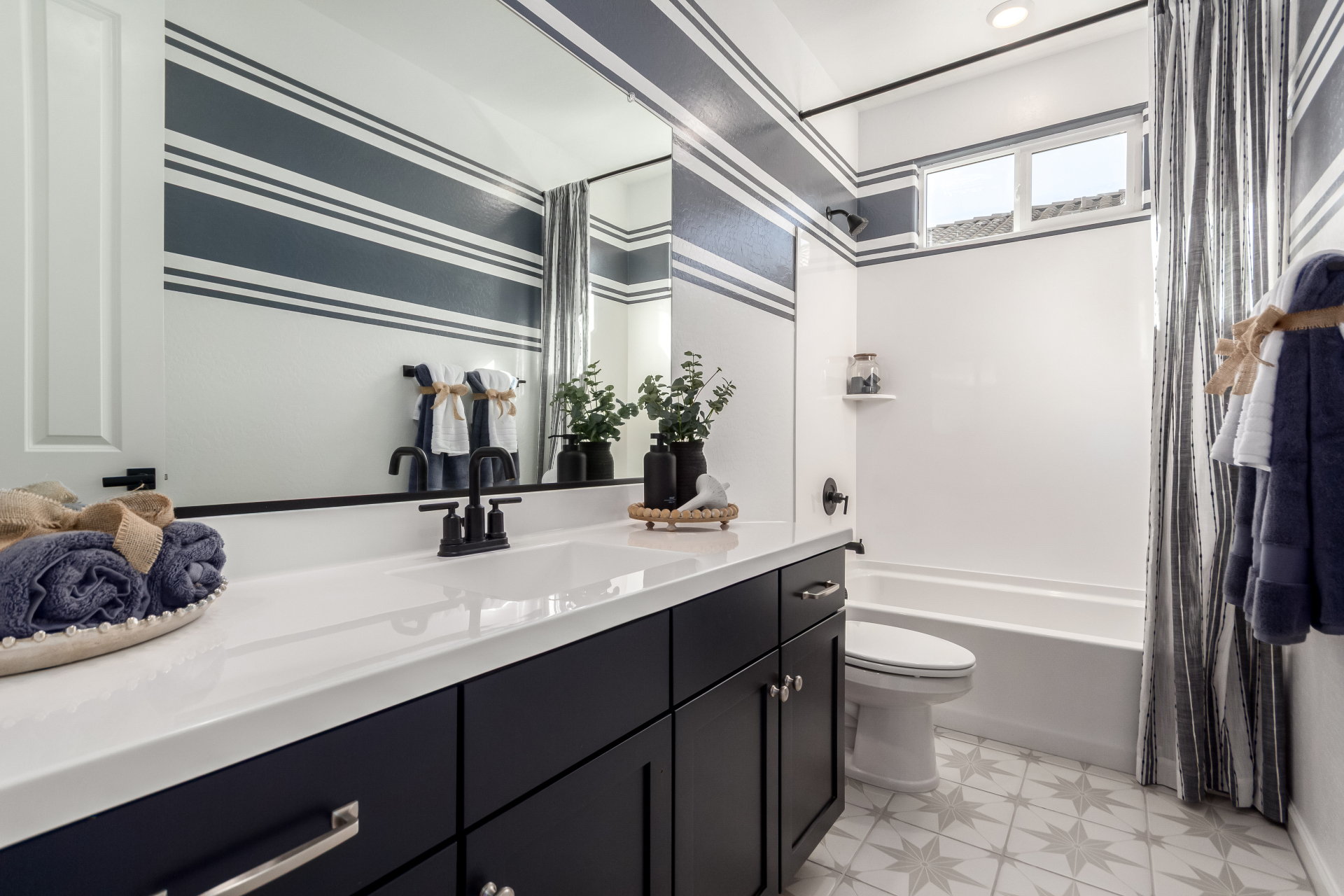 Journey model home hall bathroom with an oversized vanity