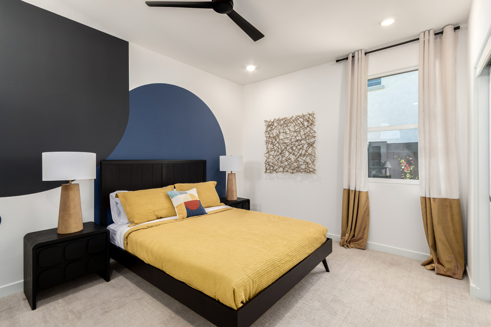 Marigold model home secondary bedroom showing a queen bed