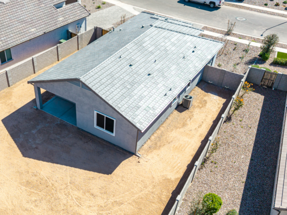 holly floor plan and rear yard as seen from a drone