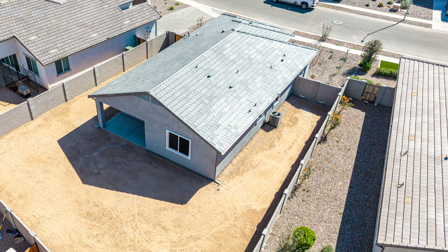 holly floor plan and rear yard as seen from a drone
