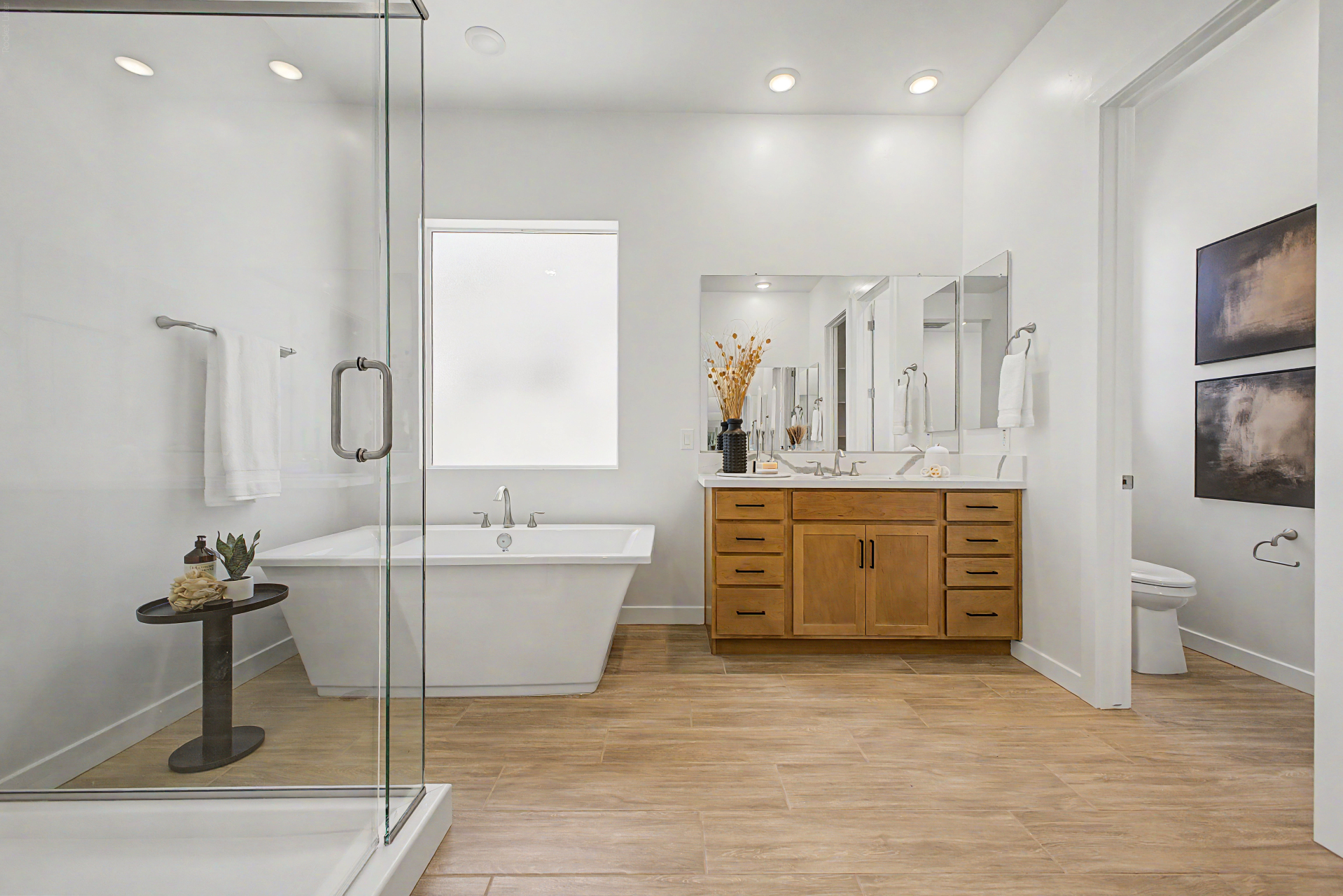 Tranquility RV Plan Master bathroom vanity, tub, and walk in shower