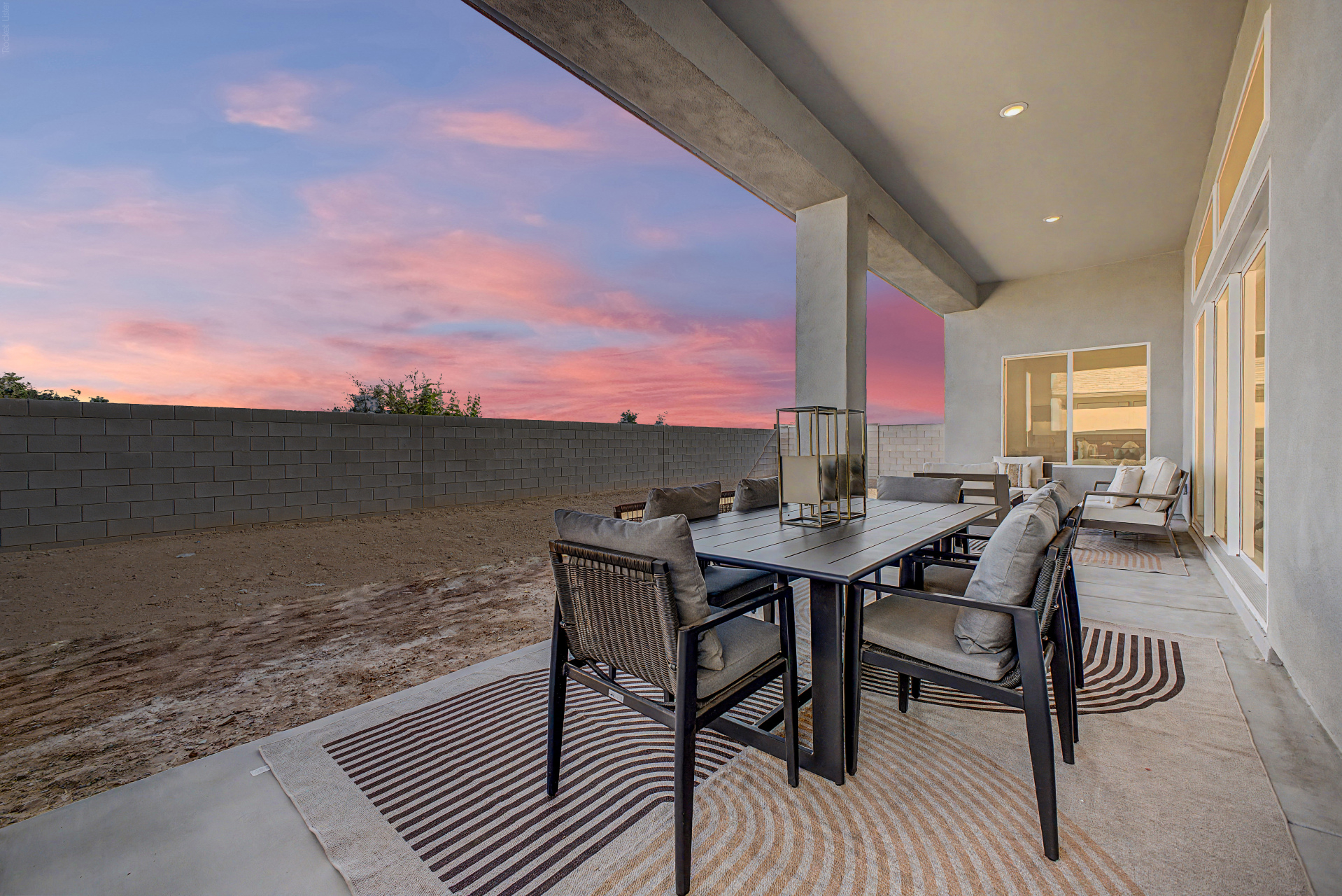 Lavish Floor Plan rear patio at twilight