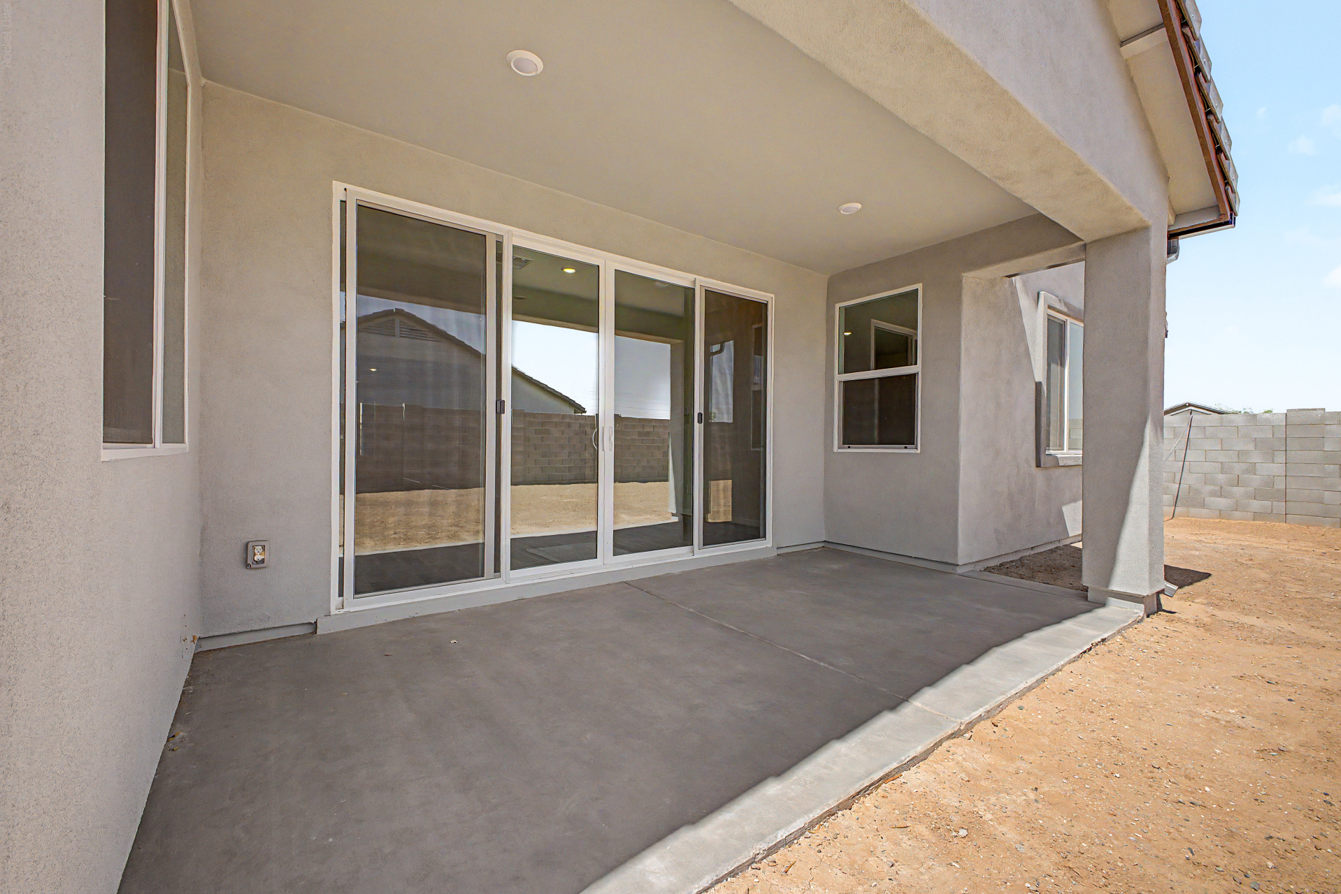 large covered patio of a violet 4414 floor plan